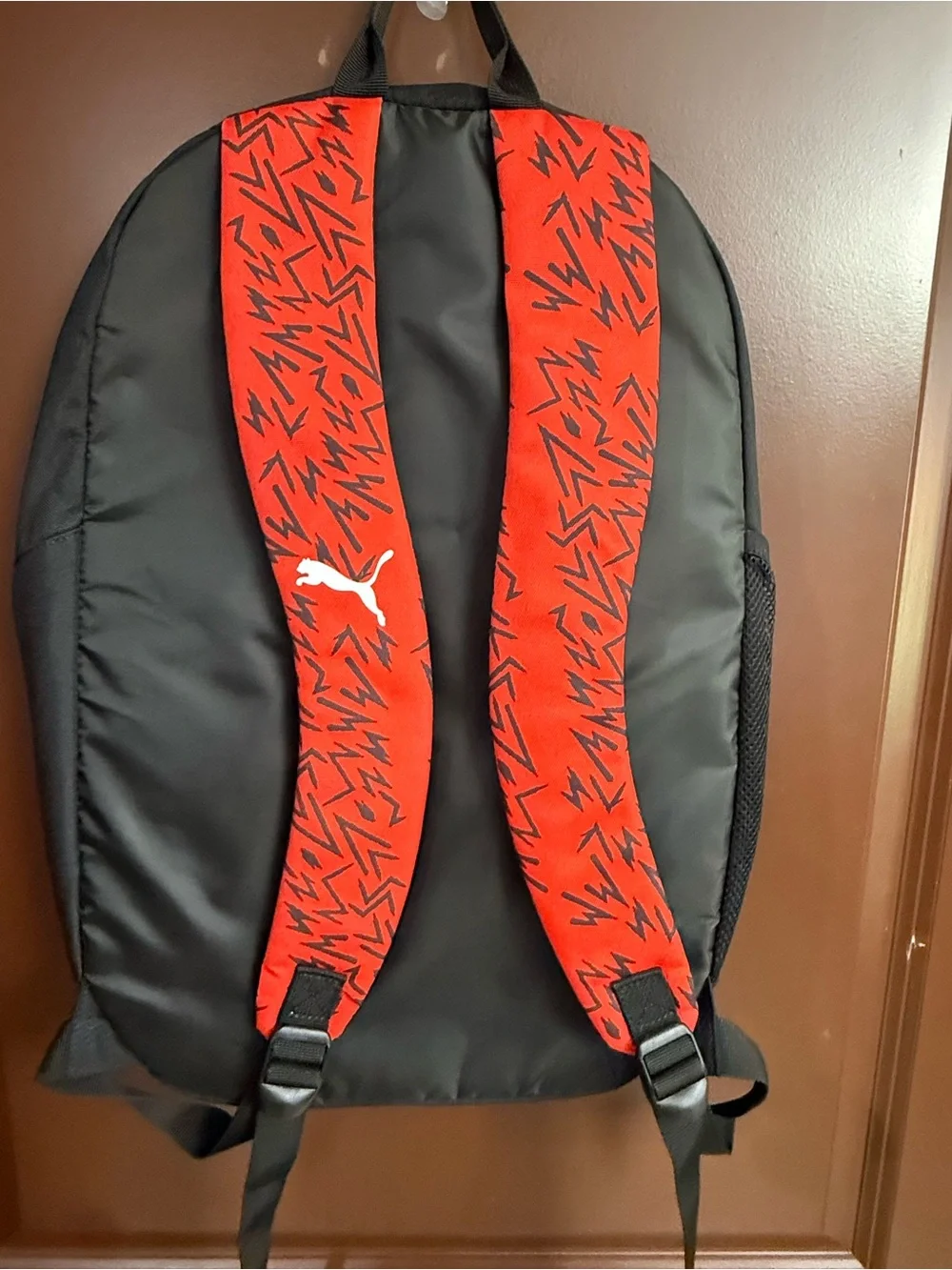Puma Black Backpack with Red Graphic Front Panel Christian Pulisic